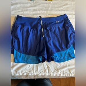 Nike Dri-FIT Running Shorts with Built-In Compression – Women’s Small Blue